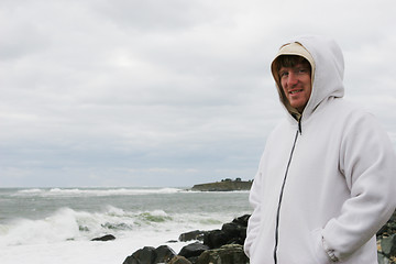 Image showing Man at the beach on a cold day