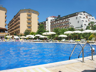 Image showing Rest in pool with transparent water