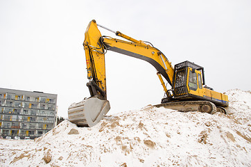 Image showing excavator sand pit snow winter apartment house 