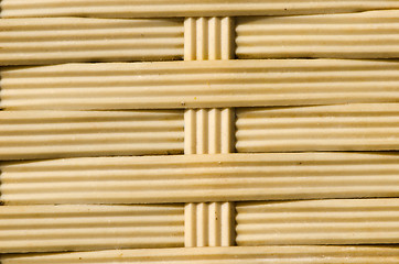 Image showing rubber straps weaved basket  background 