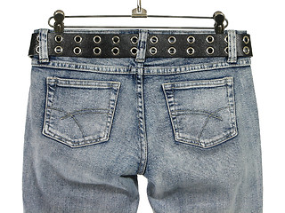 Image showing Closeup of blue jeans with leather belt