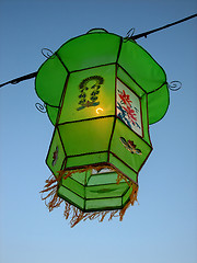 Image showing Cozy light of a green Chinese lantern