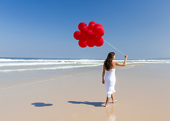 Image showing Walking with ballons