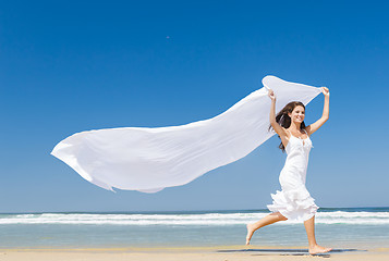 Image showing Jumping with a white scarf