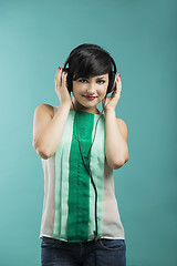 Image showing Girl listen music