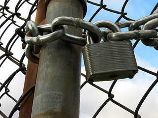 Image showing Lock, chains and chain link fence