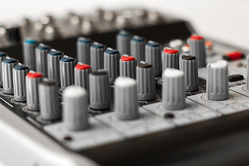 Image showing Detail of a music mixer in studio