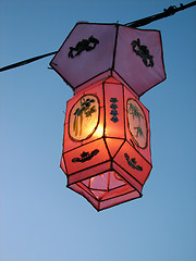 Image showing Cozy light of a pink Chinese lantern