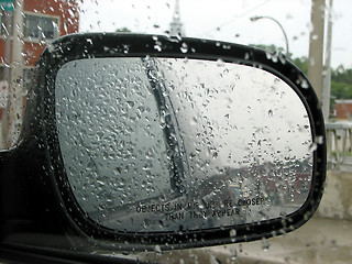 Image showing Car rear mirror with raindrops