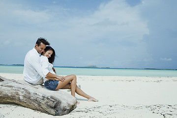 Image showing Couple romancing on the beach