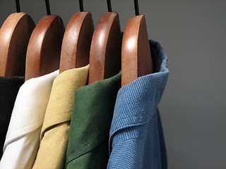 Image showing Colorful shirts in a closet