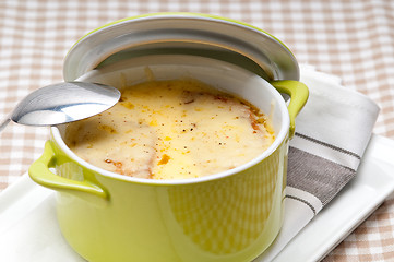 Image showing onion soup with melted cheese and bread on top