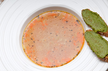 Image showing Italian minestrone soup with pesto crostini on side