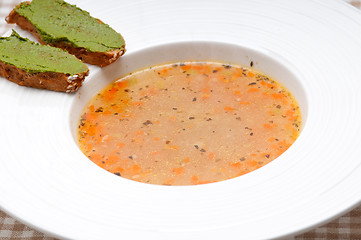 Image showing Italian minestrone soup with pesto crostini on side