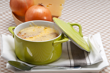 Image showing onion soup with melted cheese and bread on top