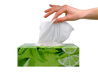 Image showing Female hand taking a tissue from a box