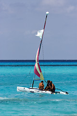 Image showing cloudy  catamaran  boat  and coastline in mexico 