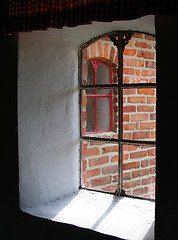 Image showing View from the window of an old brick house