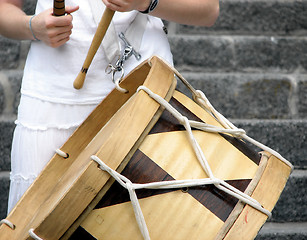 Image showing Girl playing Brazilian alfaia drum