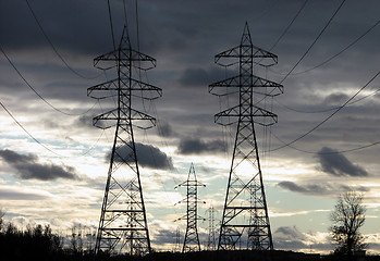 Image showing Electricity pylons at dawn