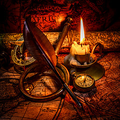 Image showing Vintage still life. Vintage items on ancient map.