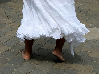 Image showing Woman in a white dress dancing to Brazilian rhythms