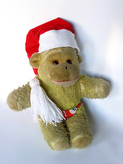 Image showing Vintage monkey toy in a Christmas hat