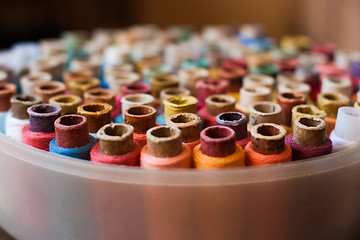 Image showing Colorful reels of threads background - A series of TAILOR related images.