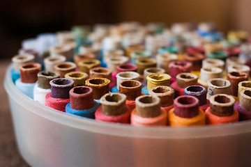 Image showing Colorful reels of threads background - A series of TAILOR related images.