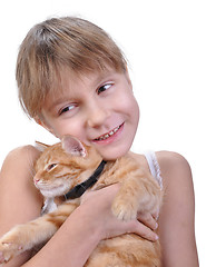 Image showing little girl hugging with her kitten