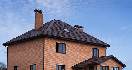 Image showing Roof tiles in a brick house