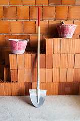 Image showing Masonry bricks, Shovel and buckets