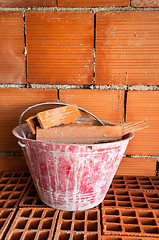 Image showing Masonry Bucket on hollow bricks