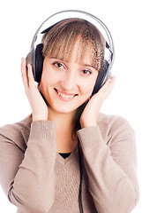 Image showing Pretty woman listening music