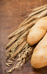 Image showing Fresh bread with ear of wheat