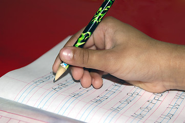 Image showing Kid doing homework