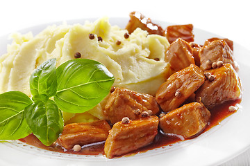 Image showing mashed potatoes and meat stew