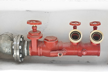 Image showing fire hose on a wall