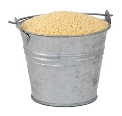 Image showing Cous cous in a miniature metal bucket