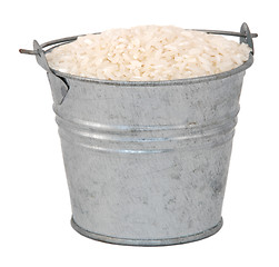 Image showing White long grain rice in a miniature metal bucket