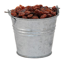 Image showing Raisins in a miniature metal bucket