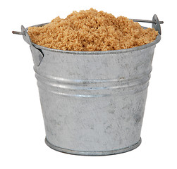 Image showing Light brown soft / muscovado sugar in a miniature metal bucket