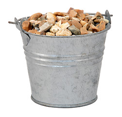 Image showing Gravel / small stones in a miniature metal bucket