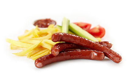 Image showing grilled sausages and french fries