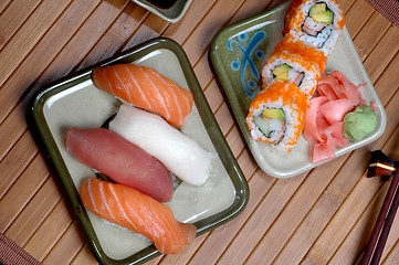 Image showing Colorful sushi diner on a wood platter