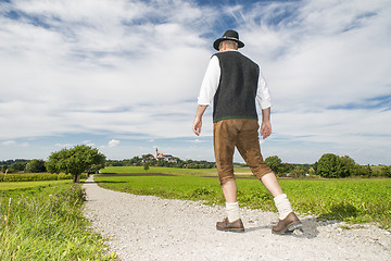 Image showing Bavarian man going to monastery Andechs