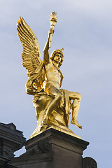 Image showing Sitting golden statue