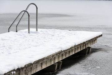 Image showing Pool ladder on a frozen lake