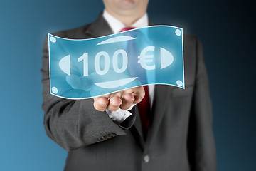 Image showing Business man with 100 Euro