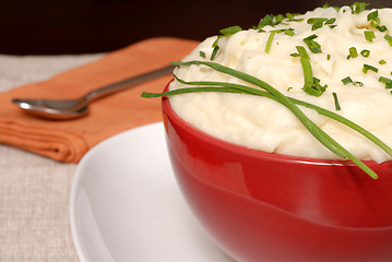 Image showing A closeup of creamy mashed potatoes with chives